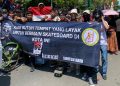 Ikut Karnaval, Skater Demak Tagih Janji Bupati Lewat Spanduk