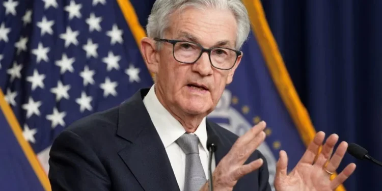 The Fed mempertahankan kebijakan pengurangan obligasi dengan langkah bertahap. Sumber Bisnis.