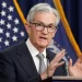 The Fed mempertahankan kebijakan pengurangan obligasi dengan langkah bertahap. Sumber Bisnis.
